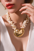 Neclage ivory